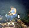 Mila_cooking_in_the_smoke.jpg